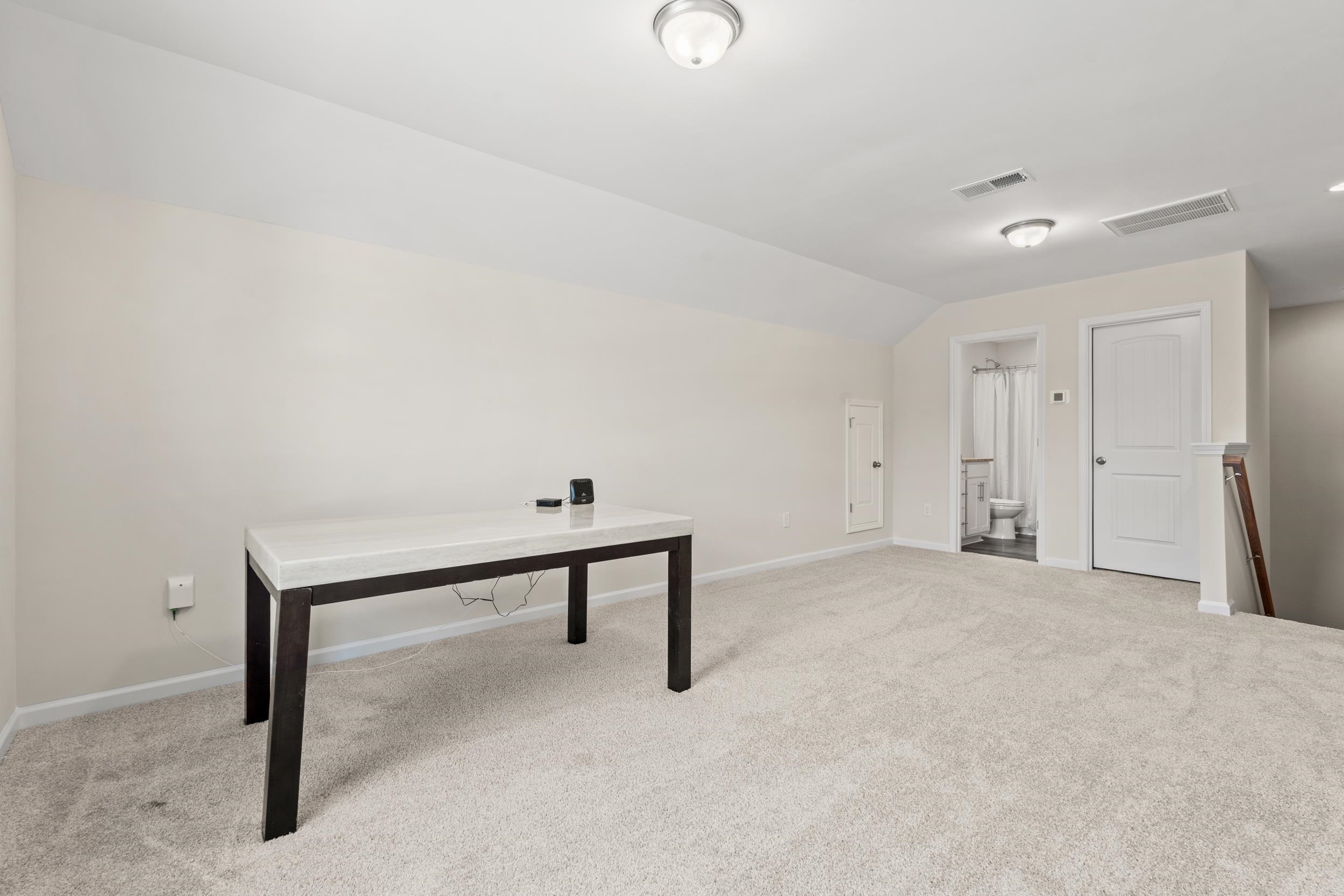 361 Palmetto Sand Loop Conway, SC 29527 - Photo 21 of 28 Unfurnished office featuring light carpet and vaulted ceiling