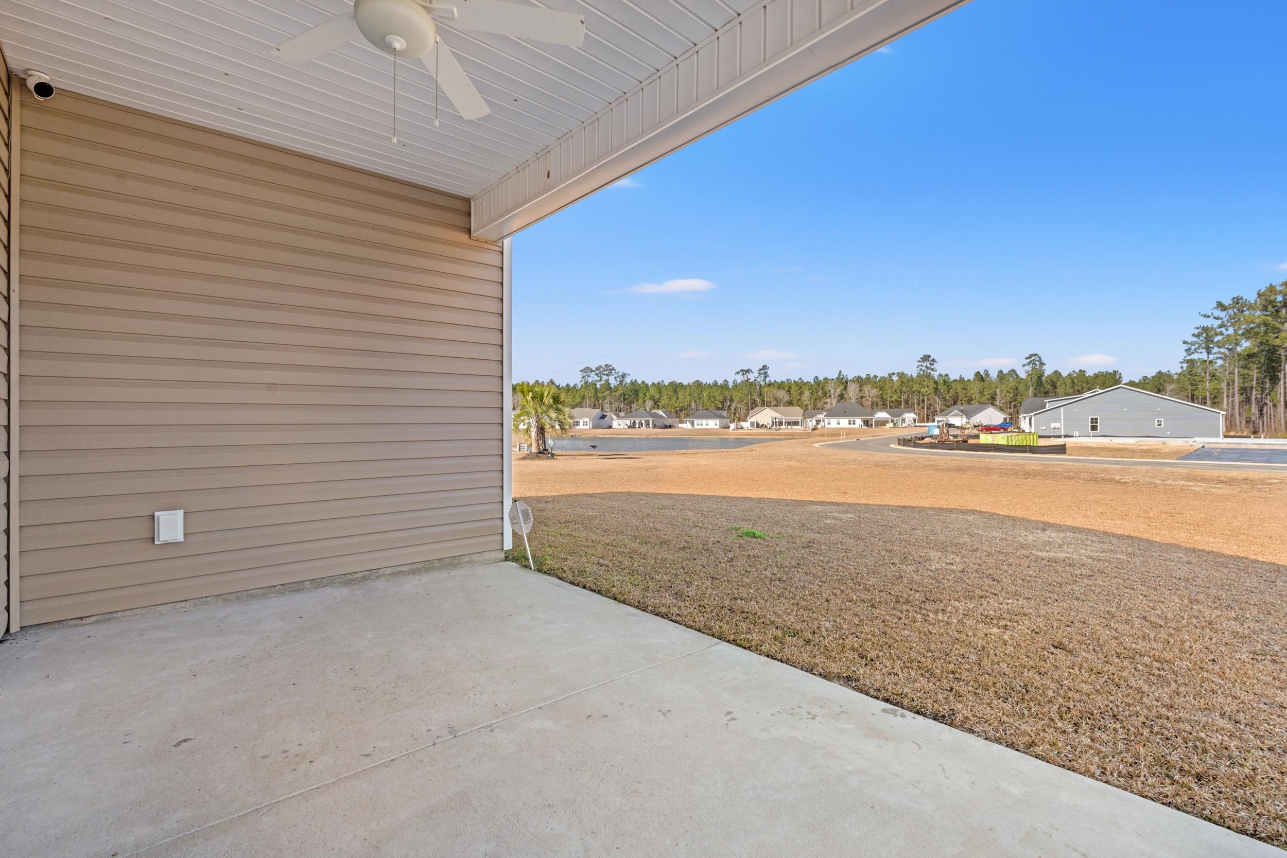 361 Palmetto Sand Loop Conway, SC 29527 - Photo 28 of 28 View of patio / terrace featuring a ceiling fan and a residential view