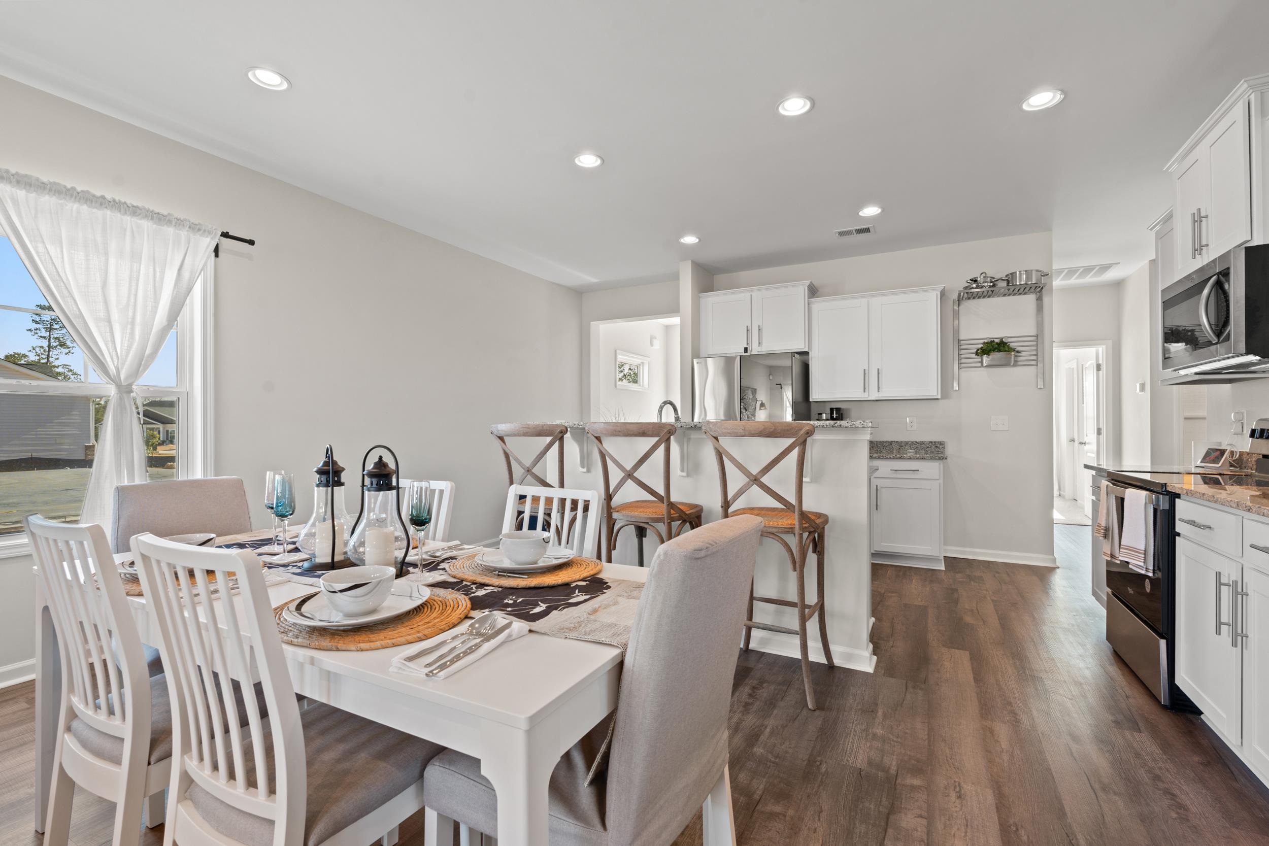 361 Palmetto Sand Loop Conway, SC 29527 - Photo 6 of 28 Dining area with recessed lighting and dark wood-style flooring