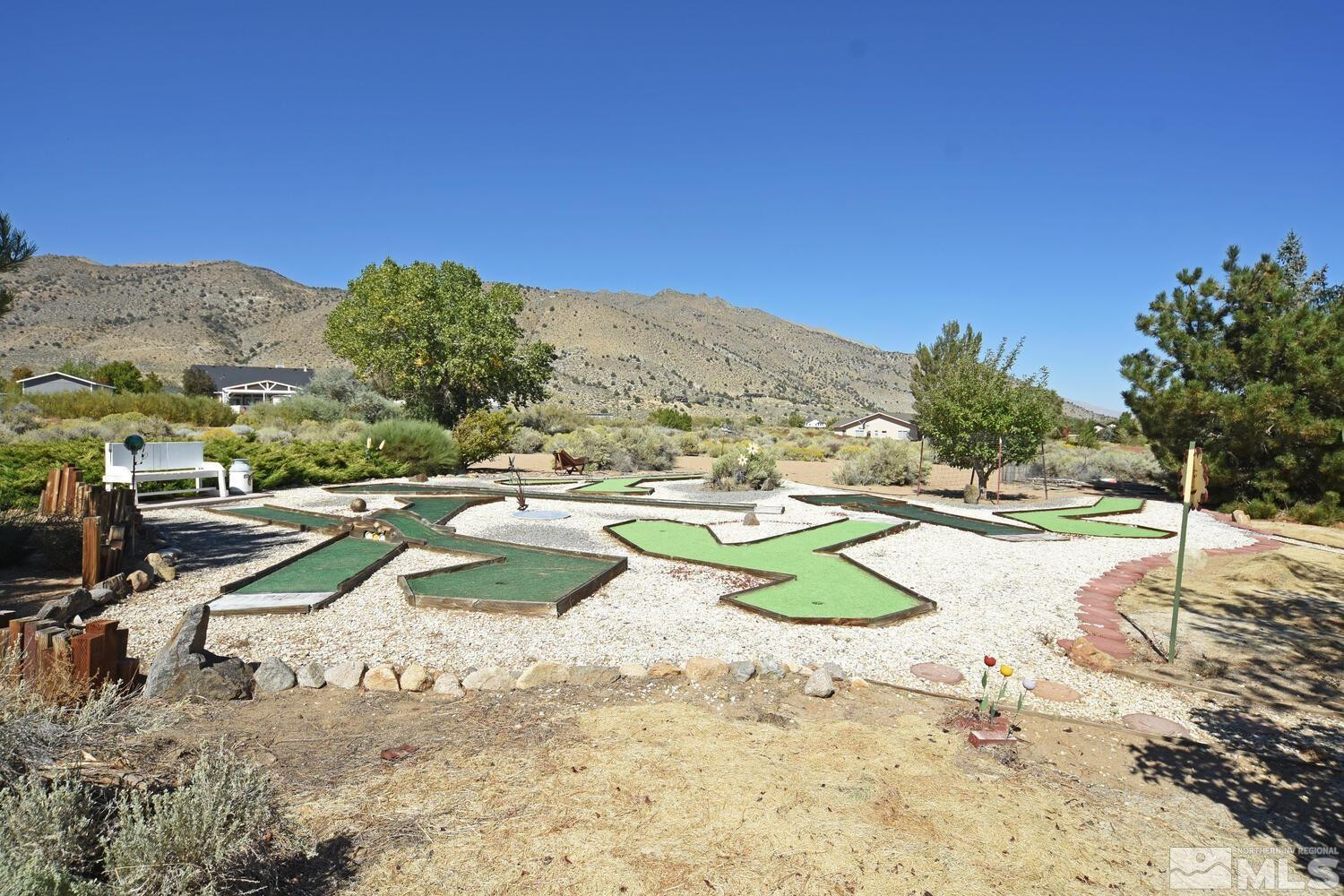 45 Lower Colony Road Wellington, NV 89444 - Photo 30 of 41 a view of a swimming pool with a yard