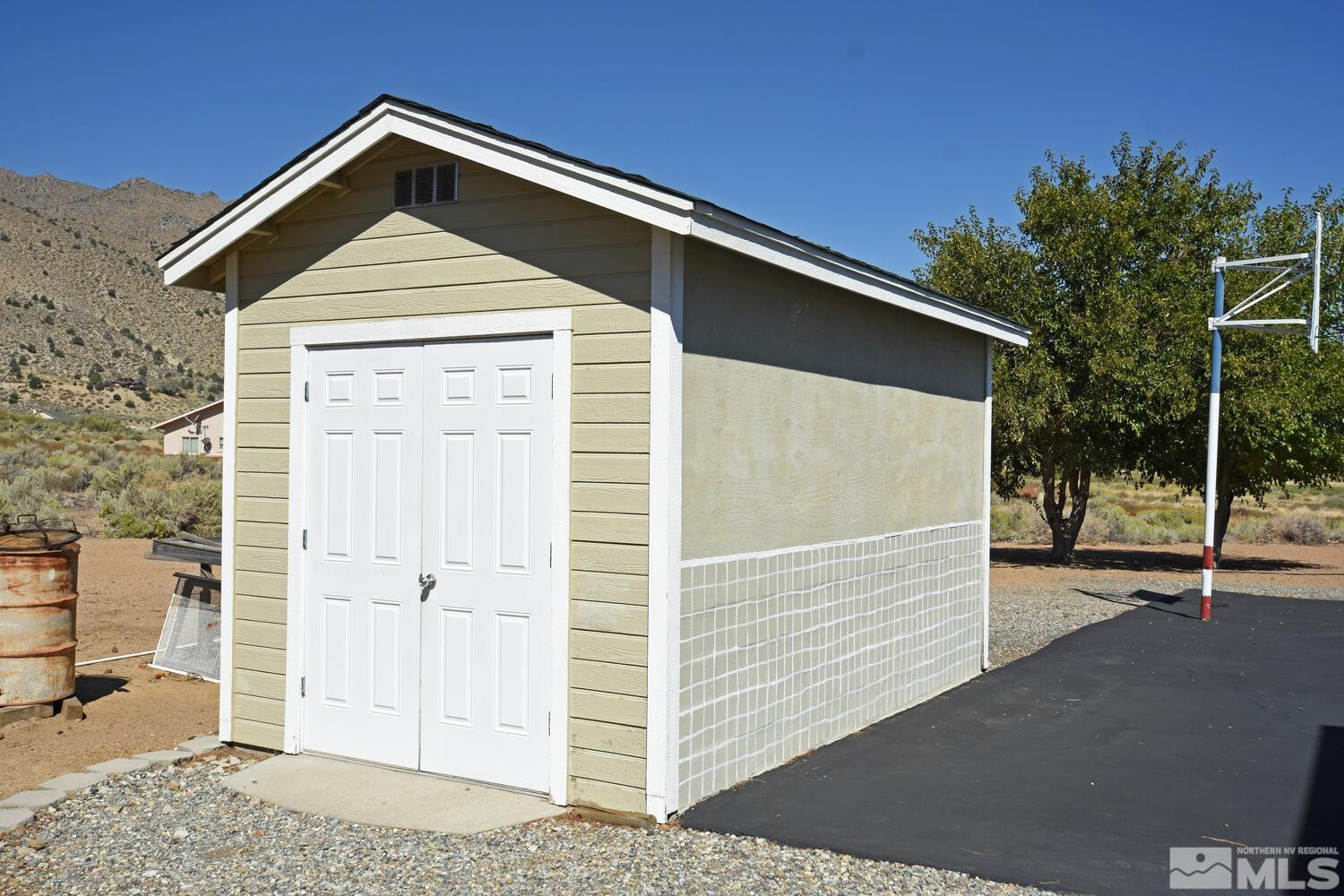 45 Lower Colony Road Wellington, NV 89444 - Photo 32 of 41 a front view of a house with parking