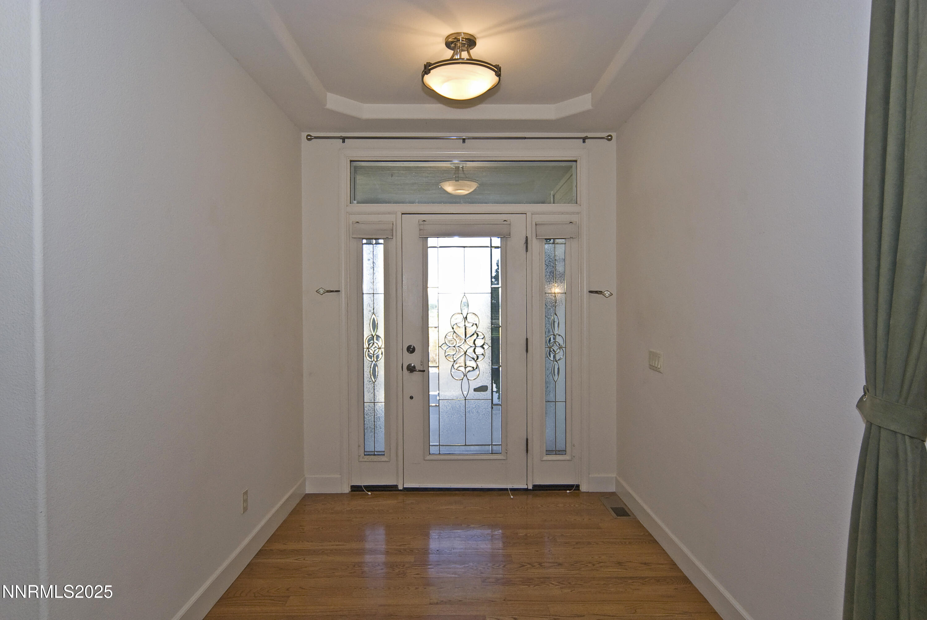 45 Lower Colony Road Wellington, NV 89444 - Photo 4 of 41 a view of a hallway with wooden floor