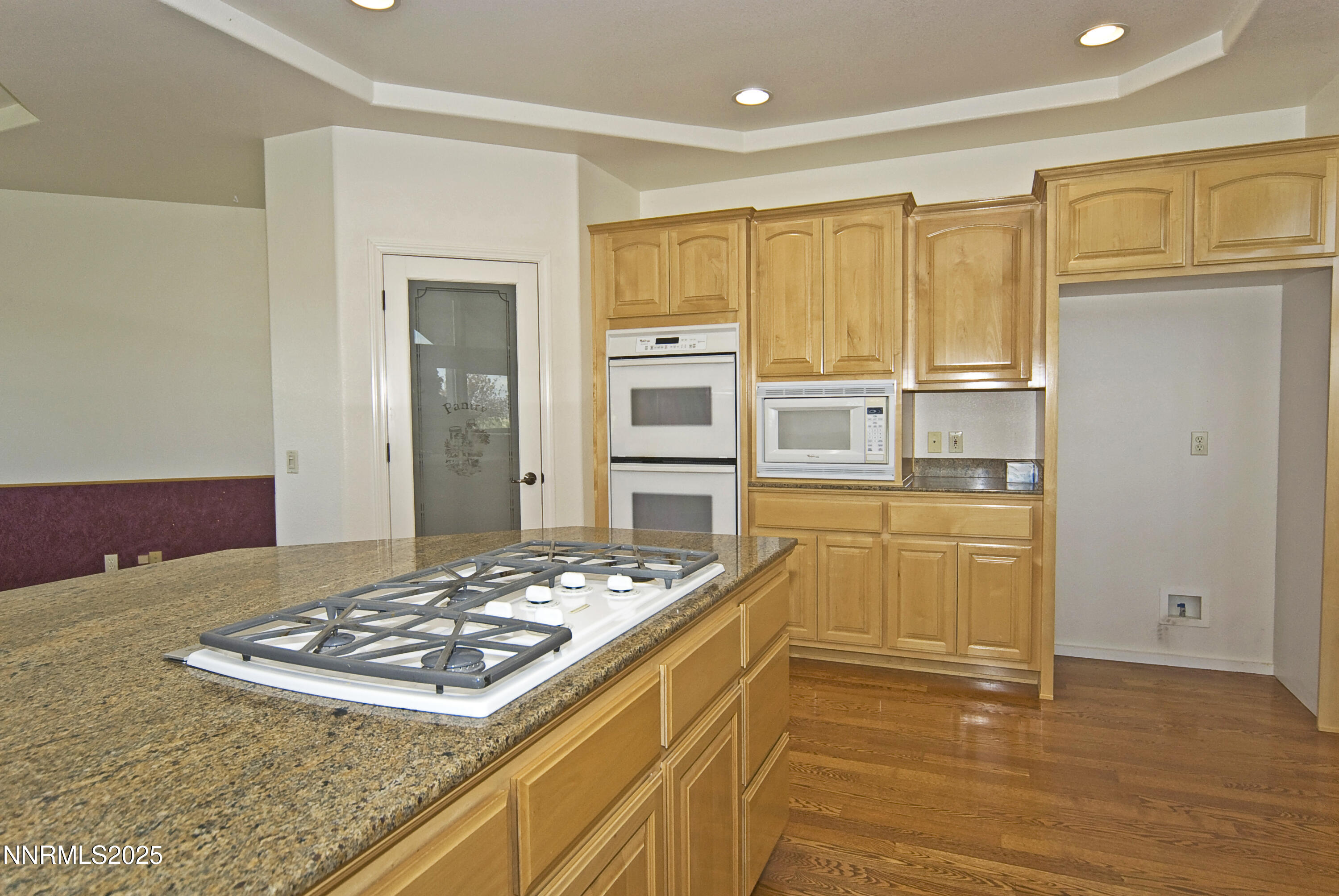 45 Lower Colony Road Wellington, NV 89444 - Photo 7 of 41 a kitchen with a stove and a refrigerator