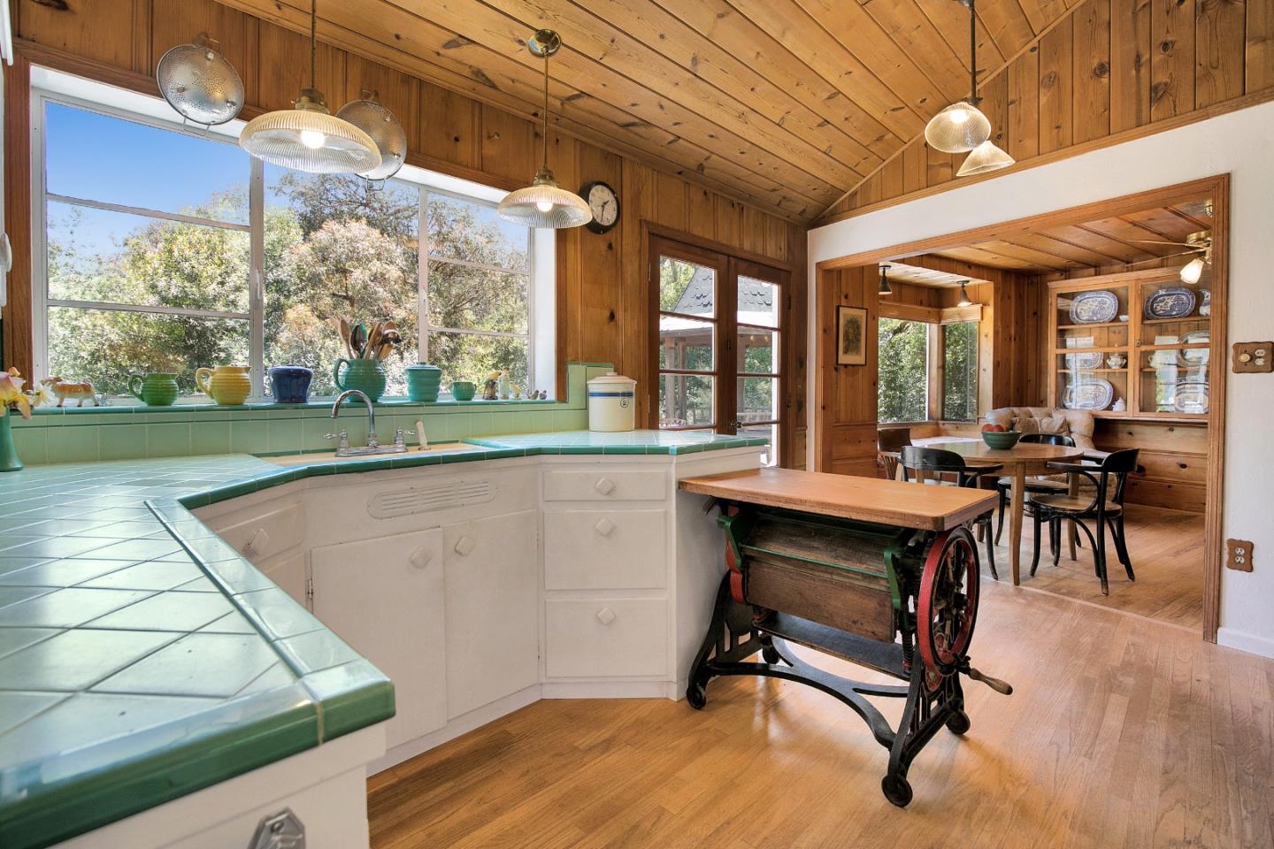 157 Happy Valley Road Santa Cruz, CA 95065 - Photo 16 of 45 a view of a patio with a table and chairs