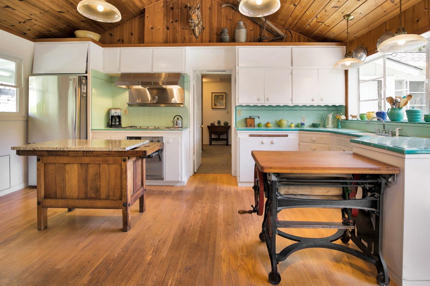 157 Happy Valley Road Santa Cruz, CA 95065 - Photo 21 of 45 a room with stainless steel appliances kitchen island granite countertop furniture and a wooden floors