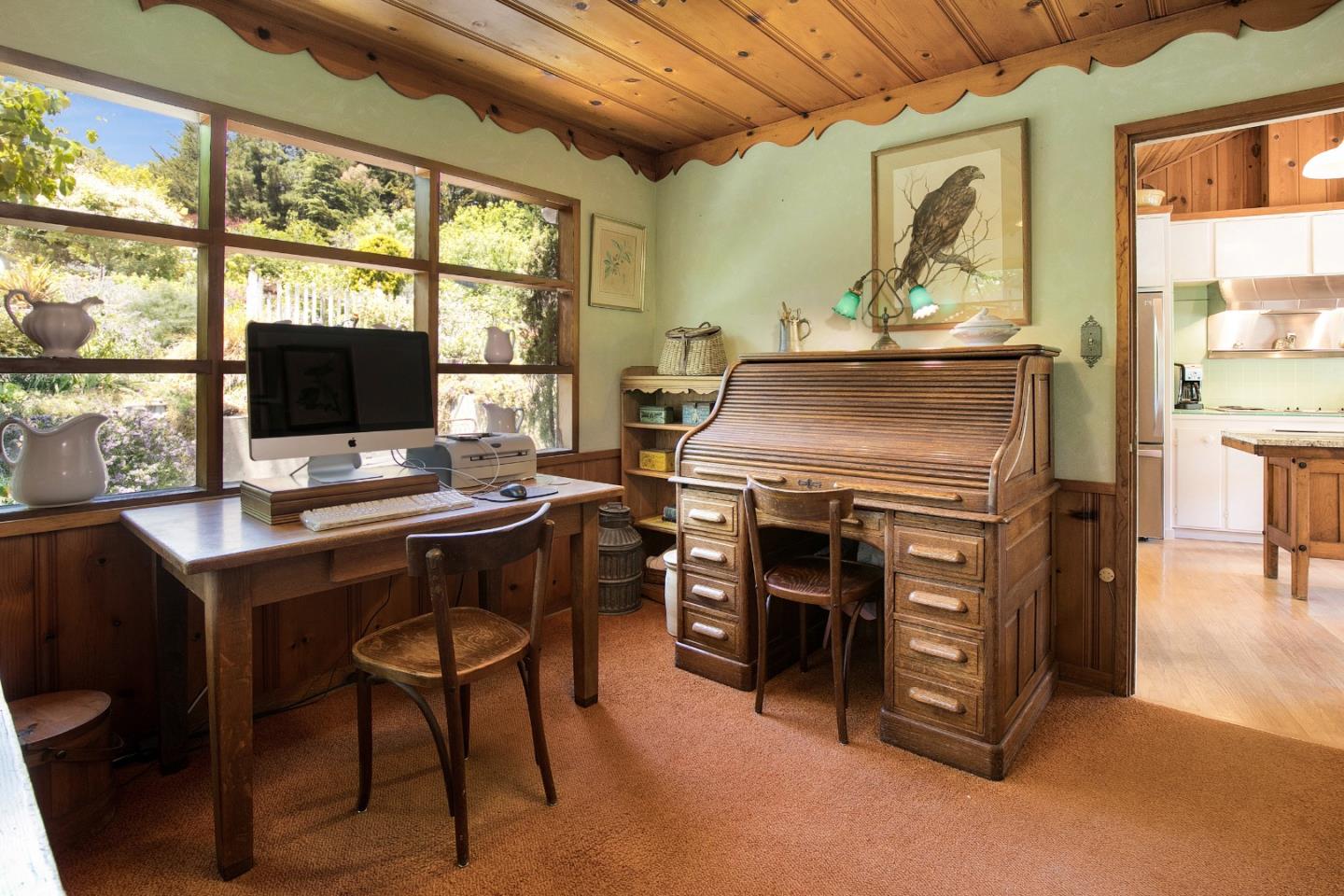 157 Happy Valley Road Santa Cruz, CA 95065 - Photo 22 of 45 a view of a workspace with furniture and a window