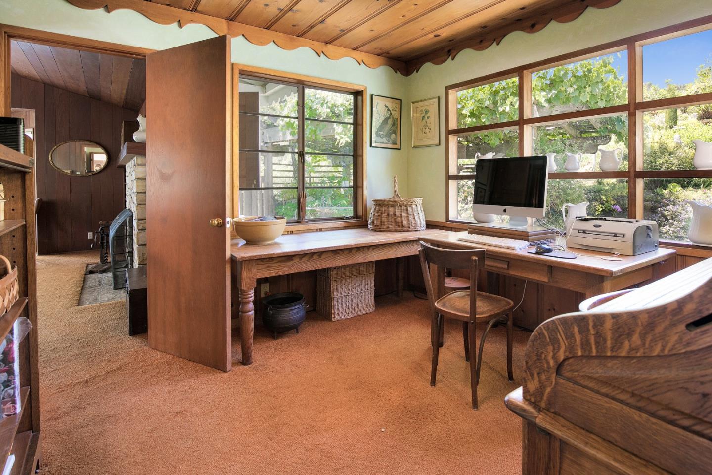157 Happy Valley Road Santa Cruz, CA 95065 - Photo 23 of 45 a view of a workspace with furniture and a window
