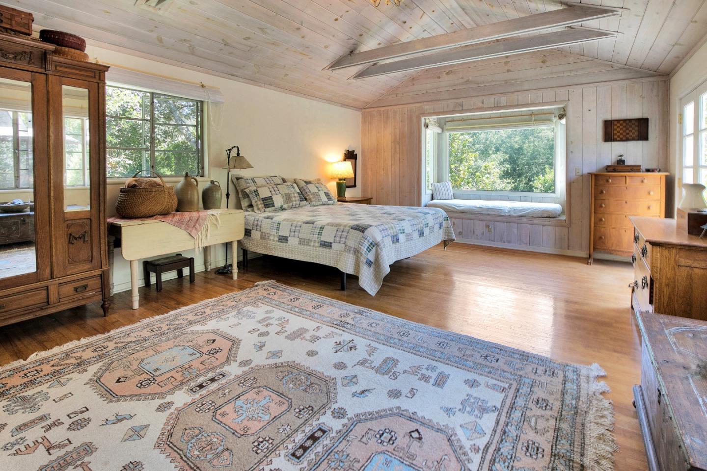 157 Happy Valley Road Santa Cruz, CA 95065 - Photo 24 of 45 a living room with furniture and a large window