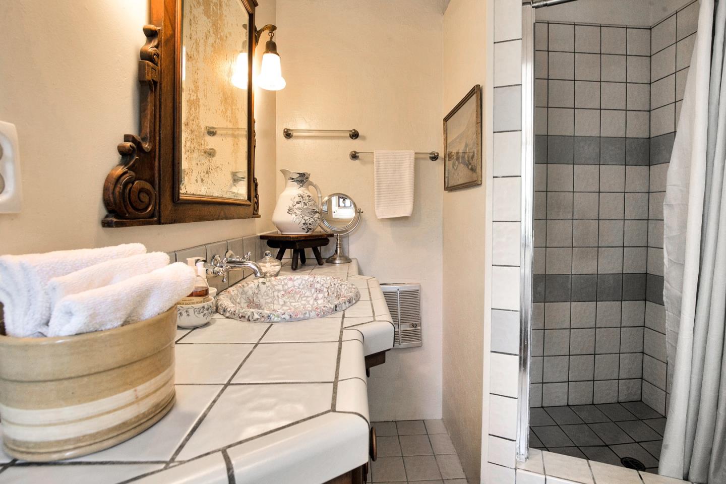 157 Happy Valley Road Santa Cruz, CA 95065 - Photo 27 of 45 a view of a living room with furniture and a floor to ceiling window