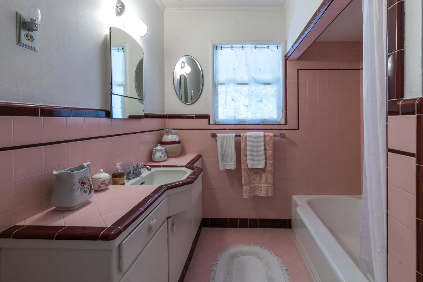 157 Happy Valley Road Santa Cruz, CA 95065 - Photo 30 of 45 a bathroom with a tub sink and mirror
