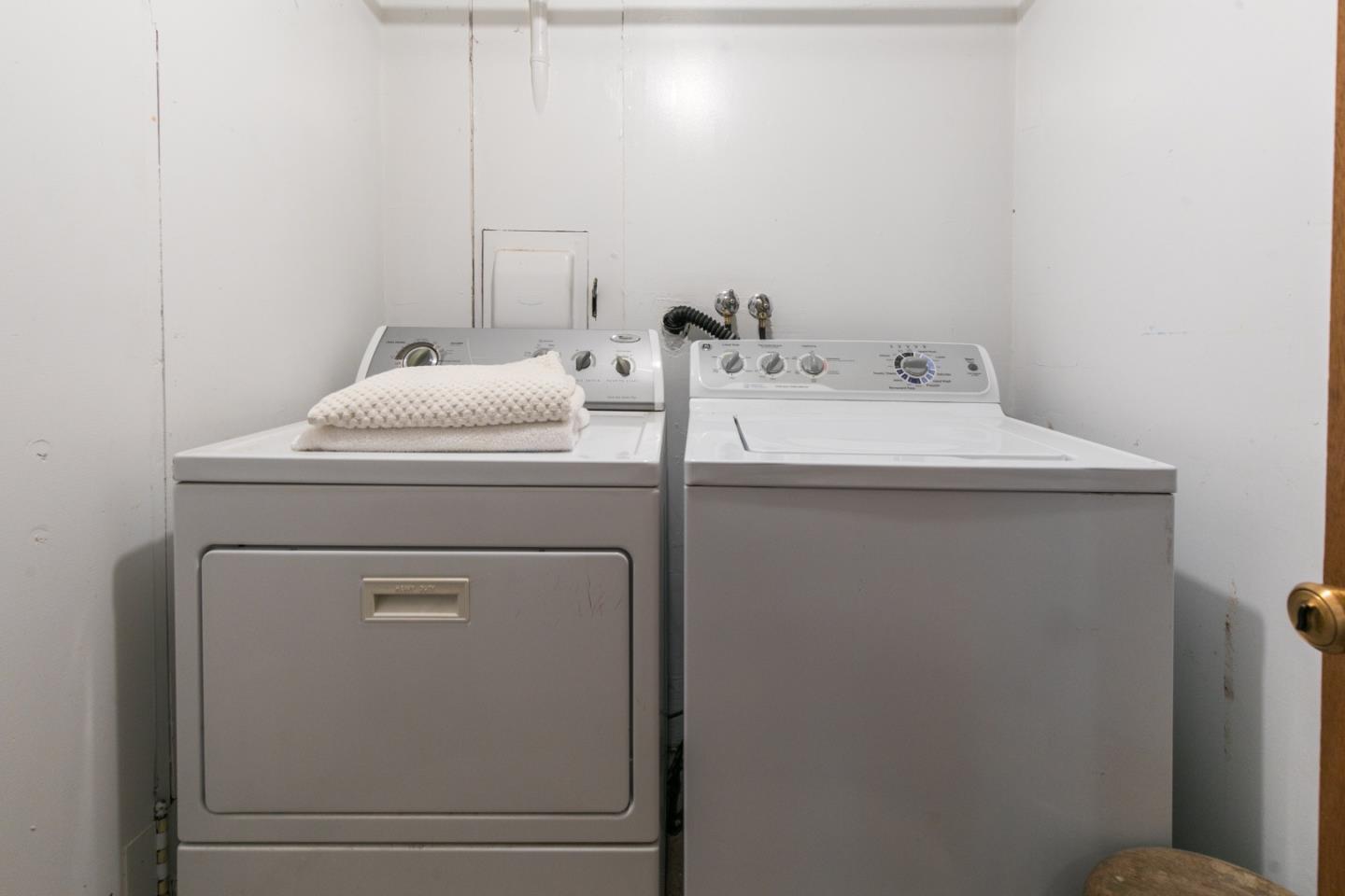 157 Happy Valley Road Santa Cruz, CA 95065 - Photo 32 of 45 a utility room with dryer and washer