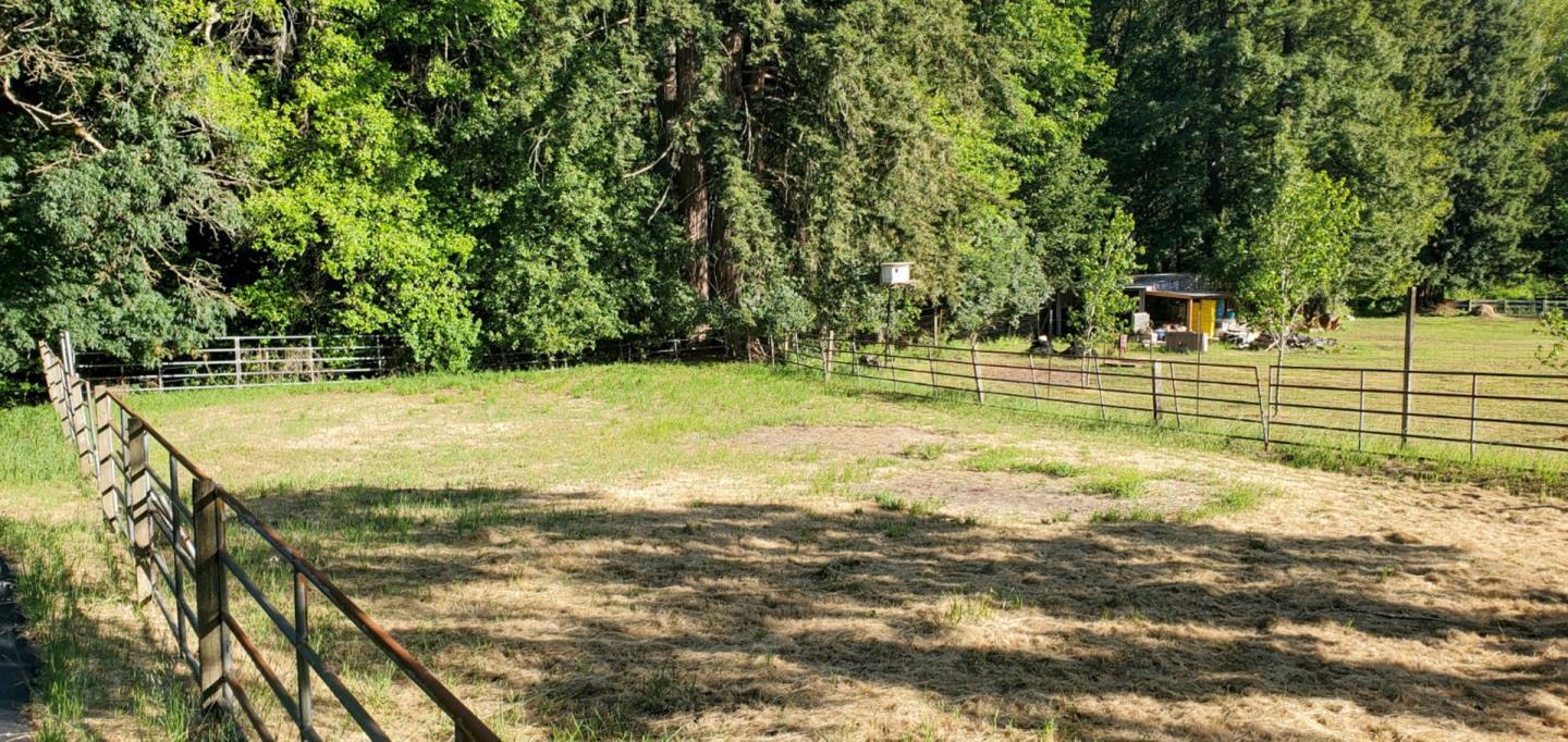 157 Happy Valley Road Santa Cruz, CA 95065 - Photo 38 of 45 a view of a swimming pool with an outdoor space and seating area