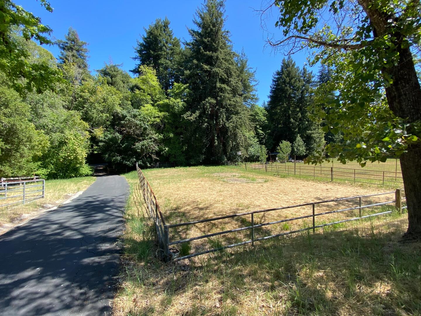 157 Happy Valley Road Santa Cruz, CA 95065 - Photo 41 of 45 a view of a lake with a yard
