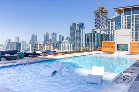 a view of a city with tall buildings