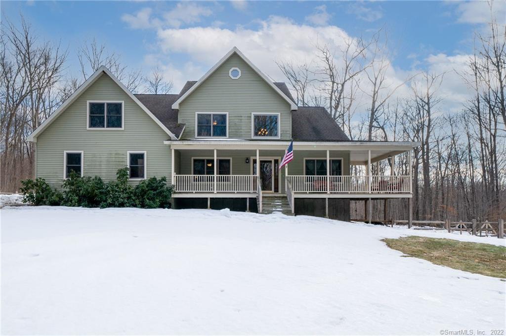 Front View Of Home. Beautiful front wrap around porch to enjoy.