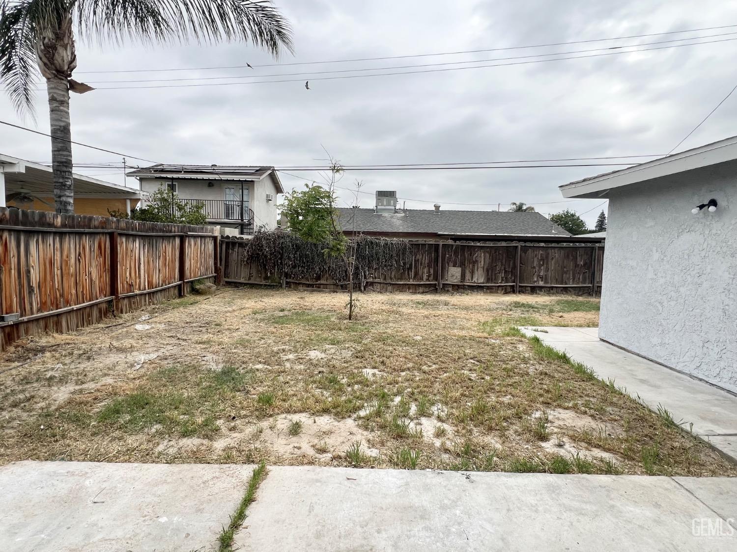 Undisclosed Address Bakersfield, CA 93307 - Photo 22 of 24 a view of a swimming pool with a chair