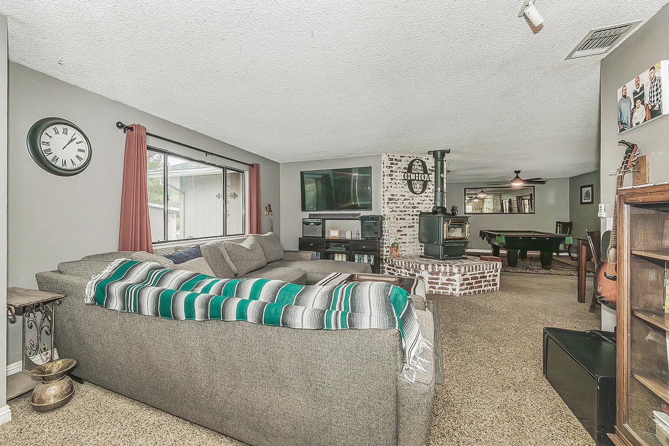 29545 Oak Meadow Road Tollhouse, CA 93667 - Photo 13 of 69 a living room with furniture and wooden floor