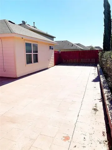 a house view with a outdoor space