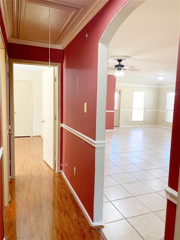 5603 Sunfall Bend Lane Katy, TX 77449 - Photo 6 of 11 a view of a hallway with wooden floor