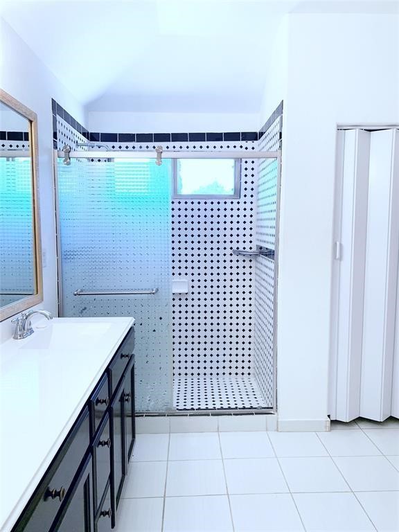 5603 Sunfall Bend Lane Katy, TX 77449 - Photo 9 of 11 a bathroom with a sink and a shower