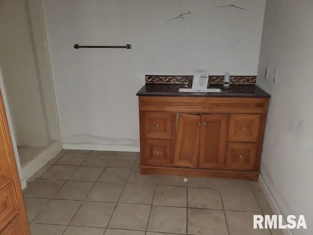 a utility room with washer and dryer
