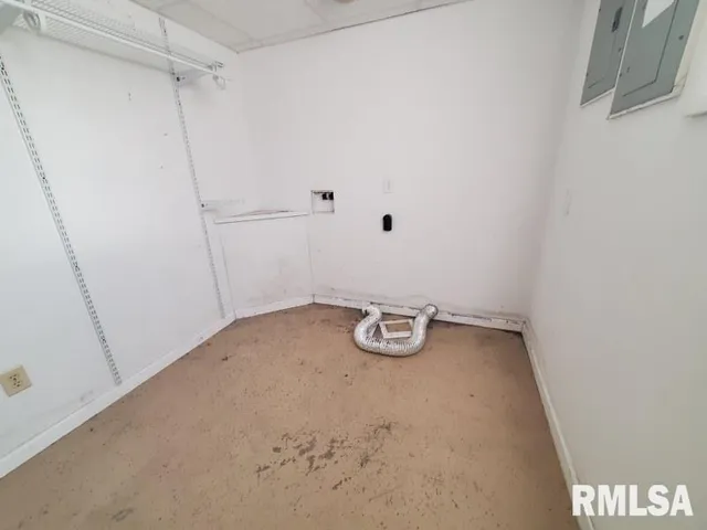 a view of a room with rack on the wall