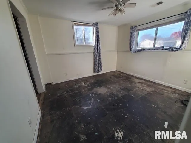 a view of a hallway with a window