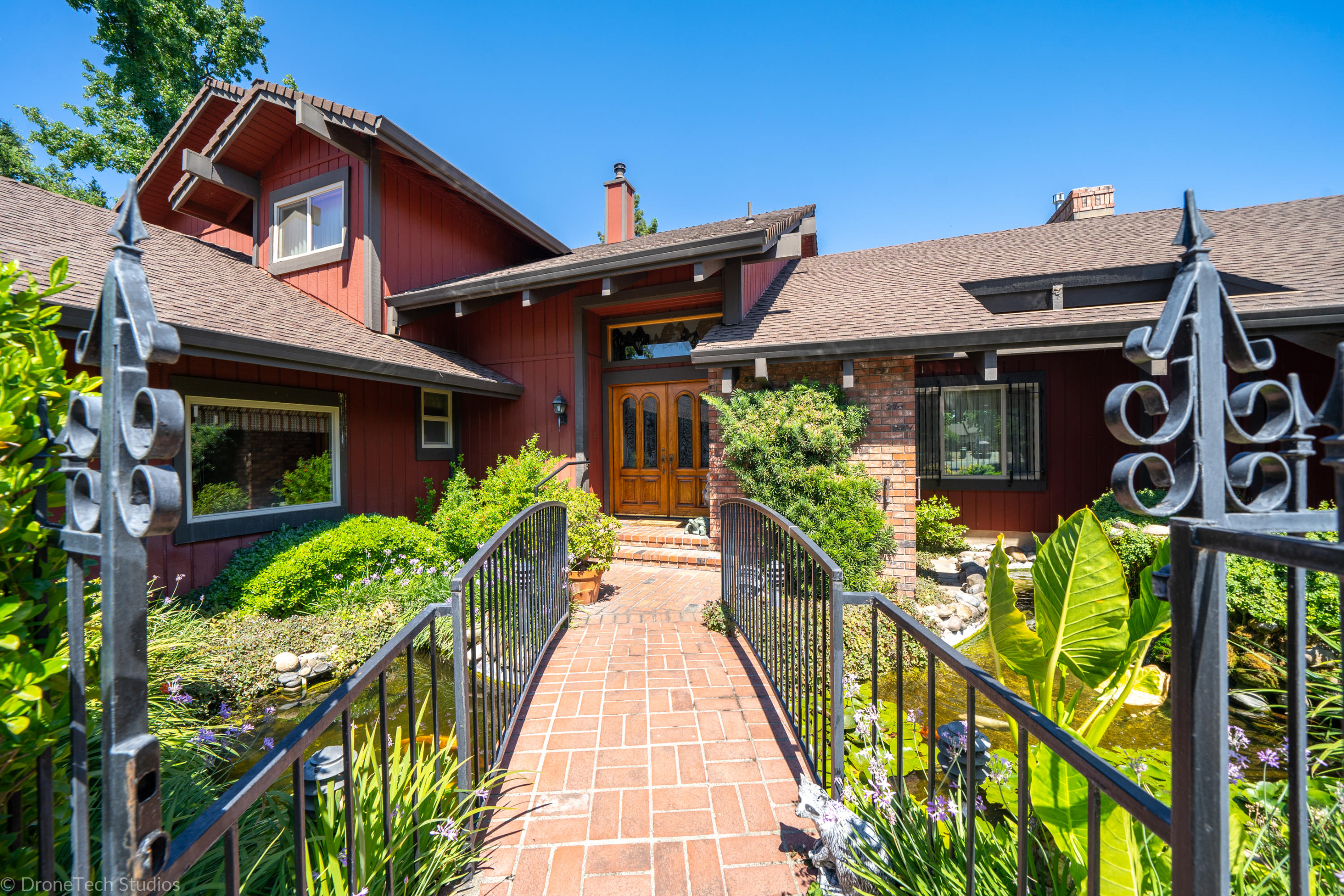 6251 Riverside Drive Redding, CA 96001 - Photo 12 of 61 BRIDGE TO FRONT DOOR