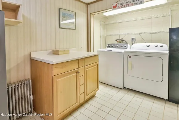 a view of entryway with wooden floor and staircase