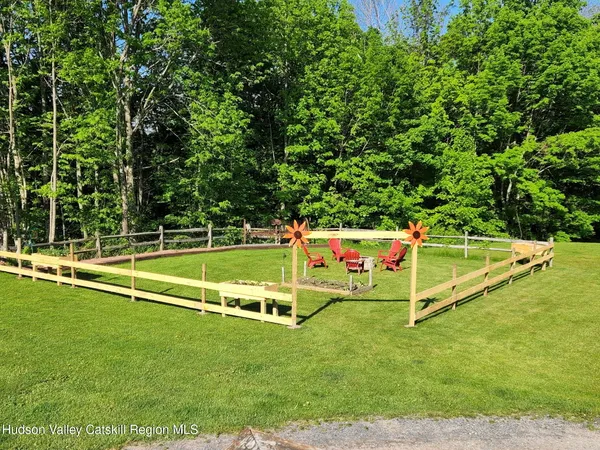 a garden view with a sitting space