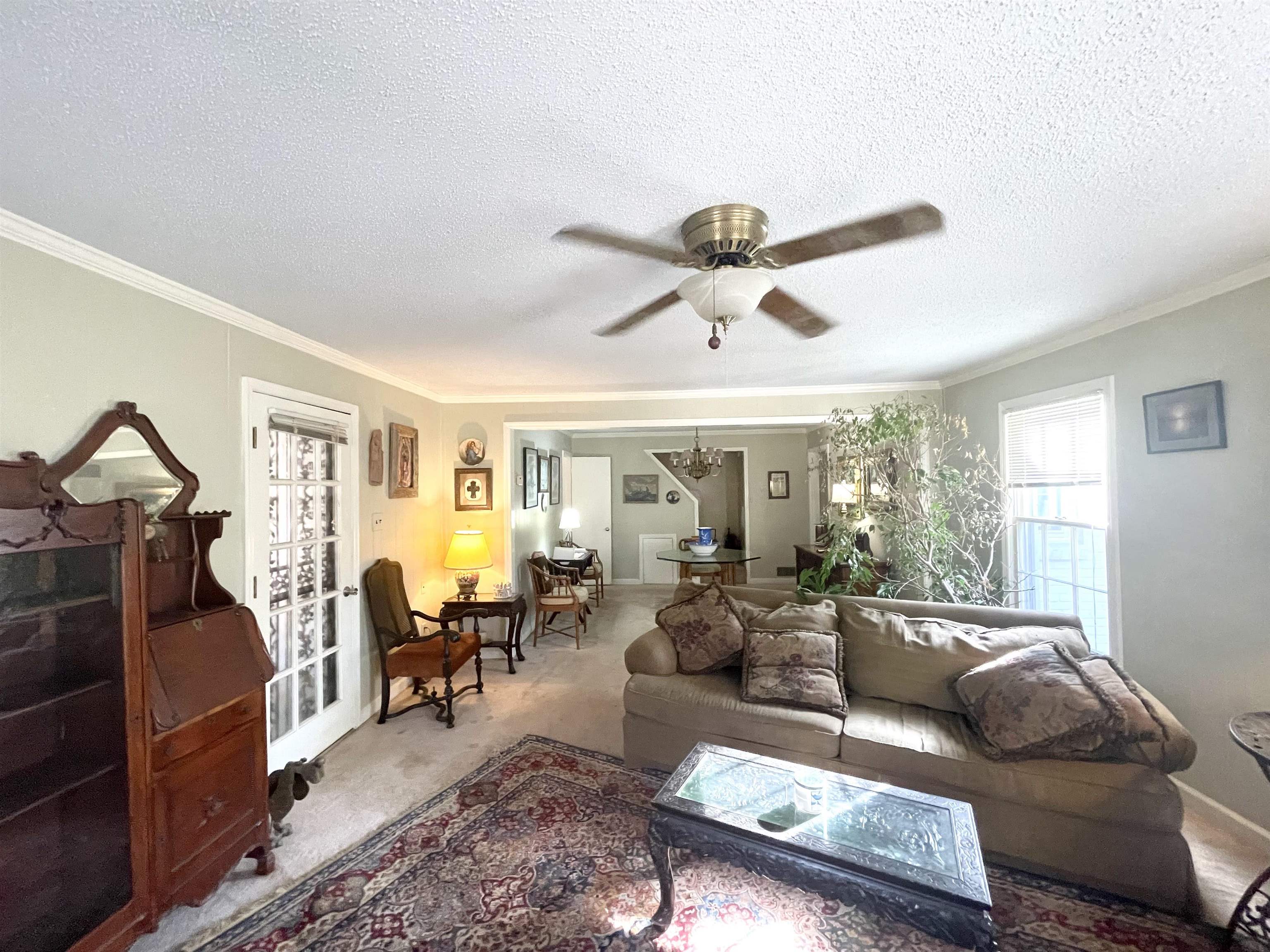 5154 Rich Road Memphis, TN 38117 - Photo 5 of 11 a living room with furniture and a large window