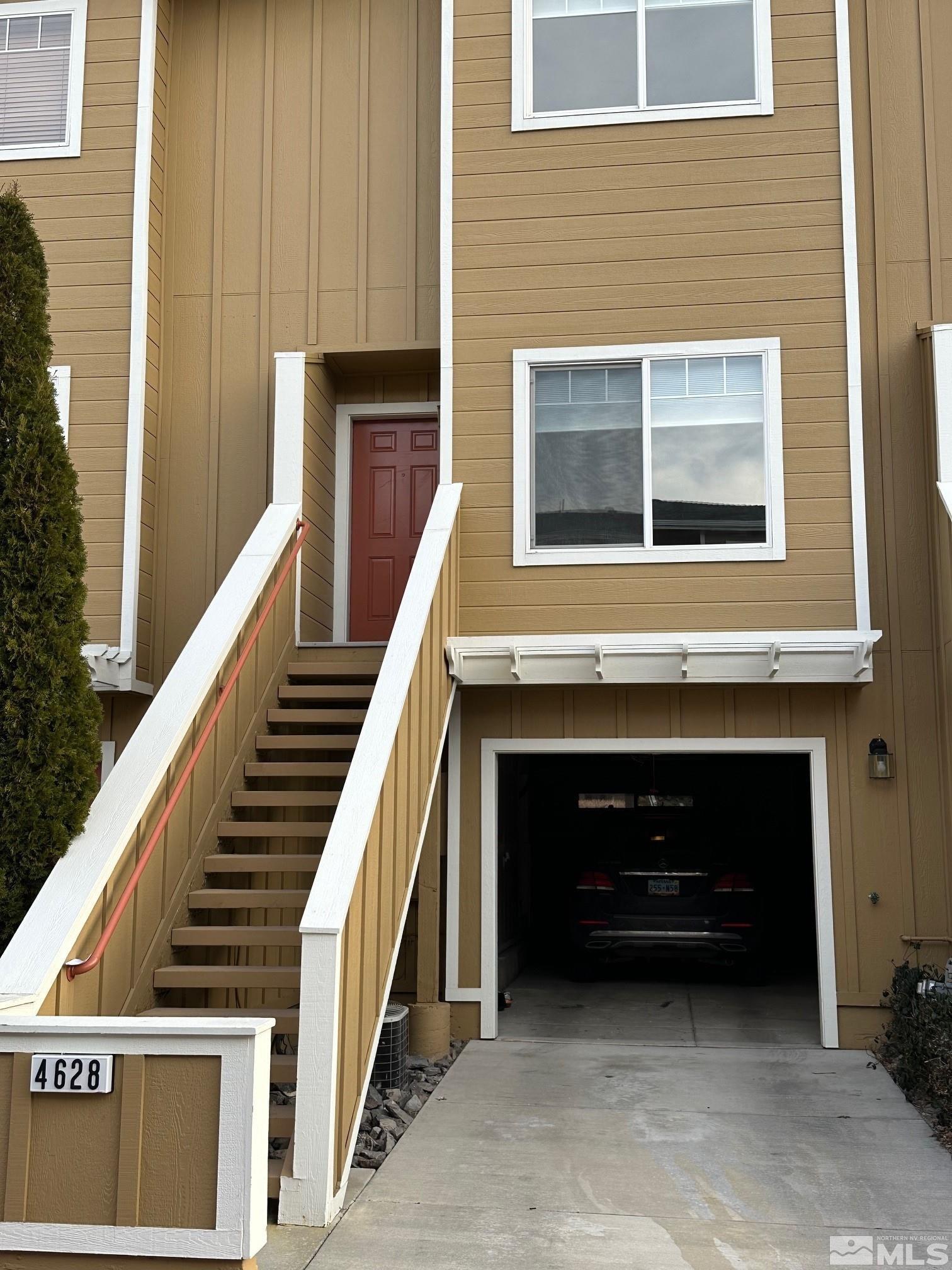 4628 Kathleen Denise Lane Reno, NV 89503 - Photo 1 of 13 a front view of a house with stairs