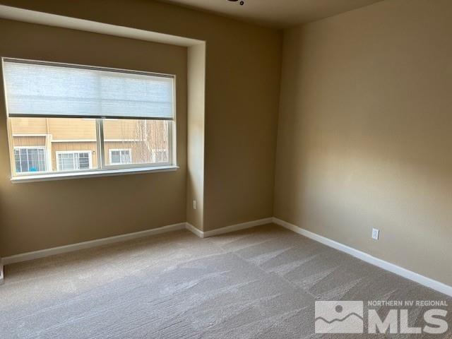 4628 Kathleen Denise Lane Reno, NV 89503 - Photo 5 of 13 an empty room with windows