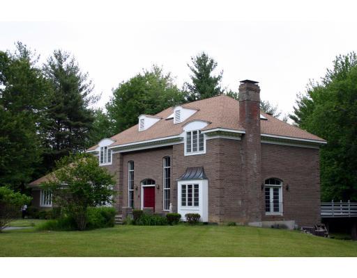 36 Brown Road Harvard, MA 01451 - Photo 2 of 10 a front view of house with a garden
