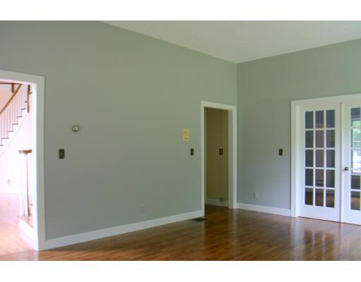 36 Brown Road Harvard, MA 01451 - Photo 7 of 10 a view of an empty room with wooden floor and a window