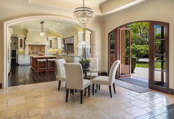 247 Atherton Avenue Atherton, CA 94027 - Photo 3 of 8 a dining room with furniture a chandelier and wooden floor
