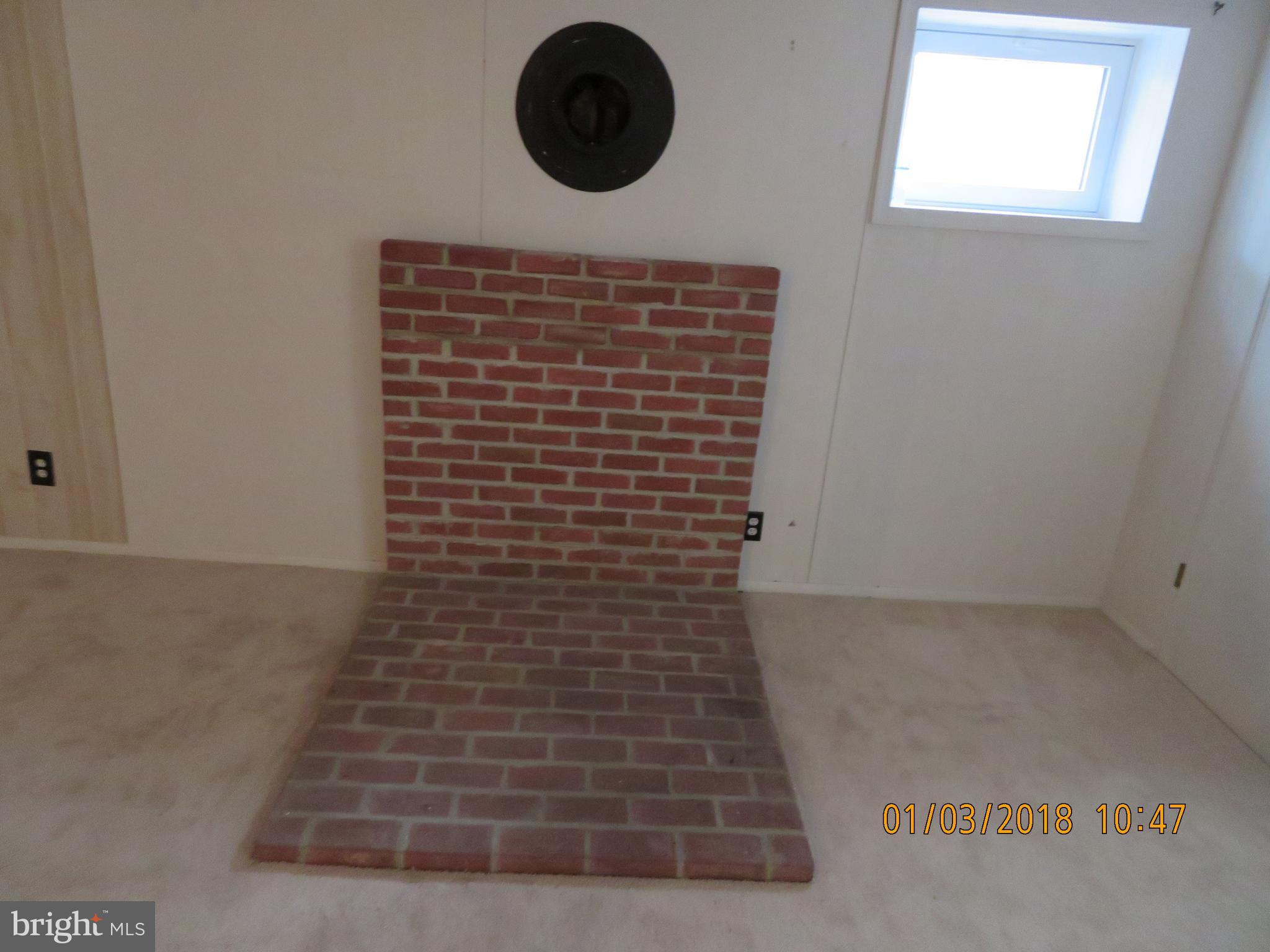 3920 Decatur Avenue Kensington, MD 20895 - Photo 17 of 20 Location for Wood stove
