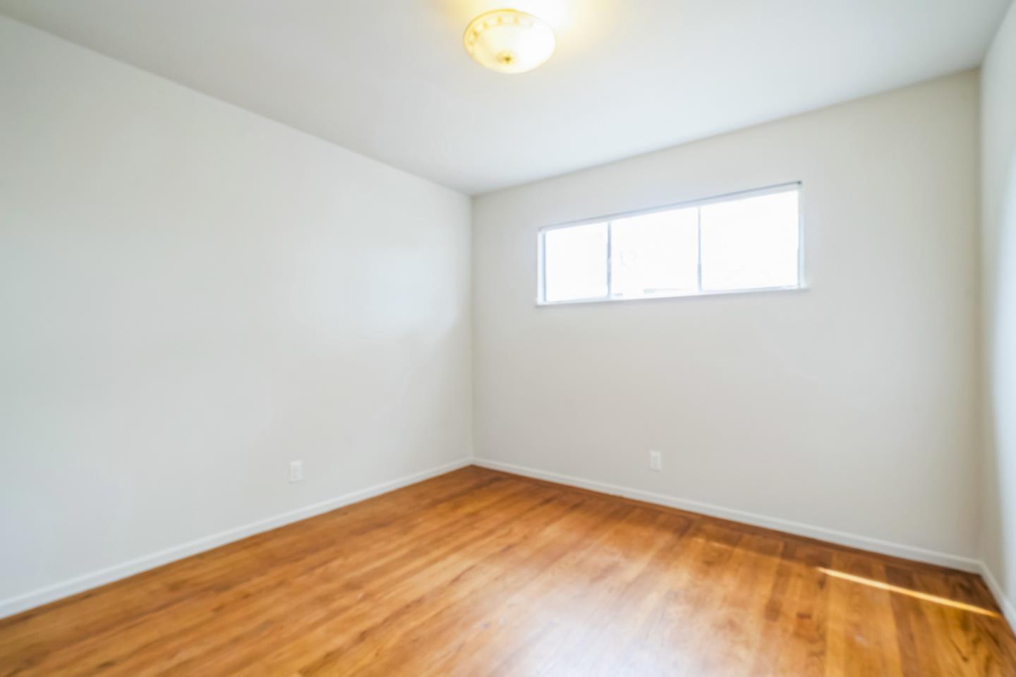 1222 Morningside Drive Sunnyvale, CA 94087 - Photo 19 of 34 a view of empty room with wooden floor
