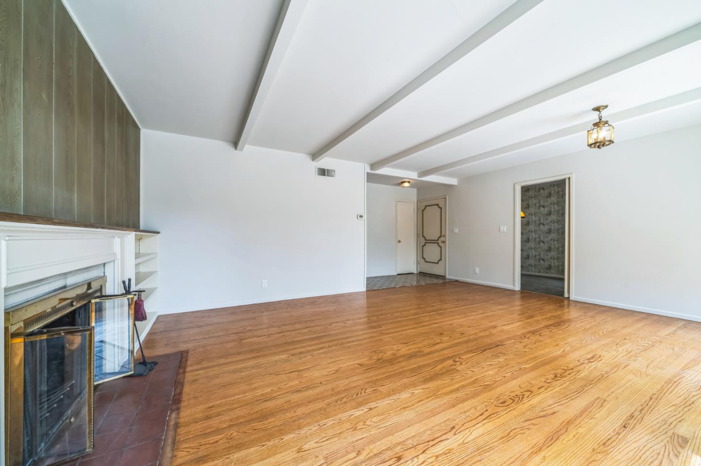 1222 Morningside Drive Sunnyvale, CA 94087 - Photo 9 of 34 a view of empty room with wooden floor and fan
