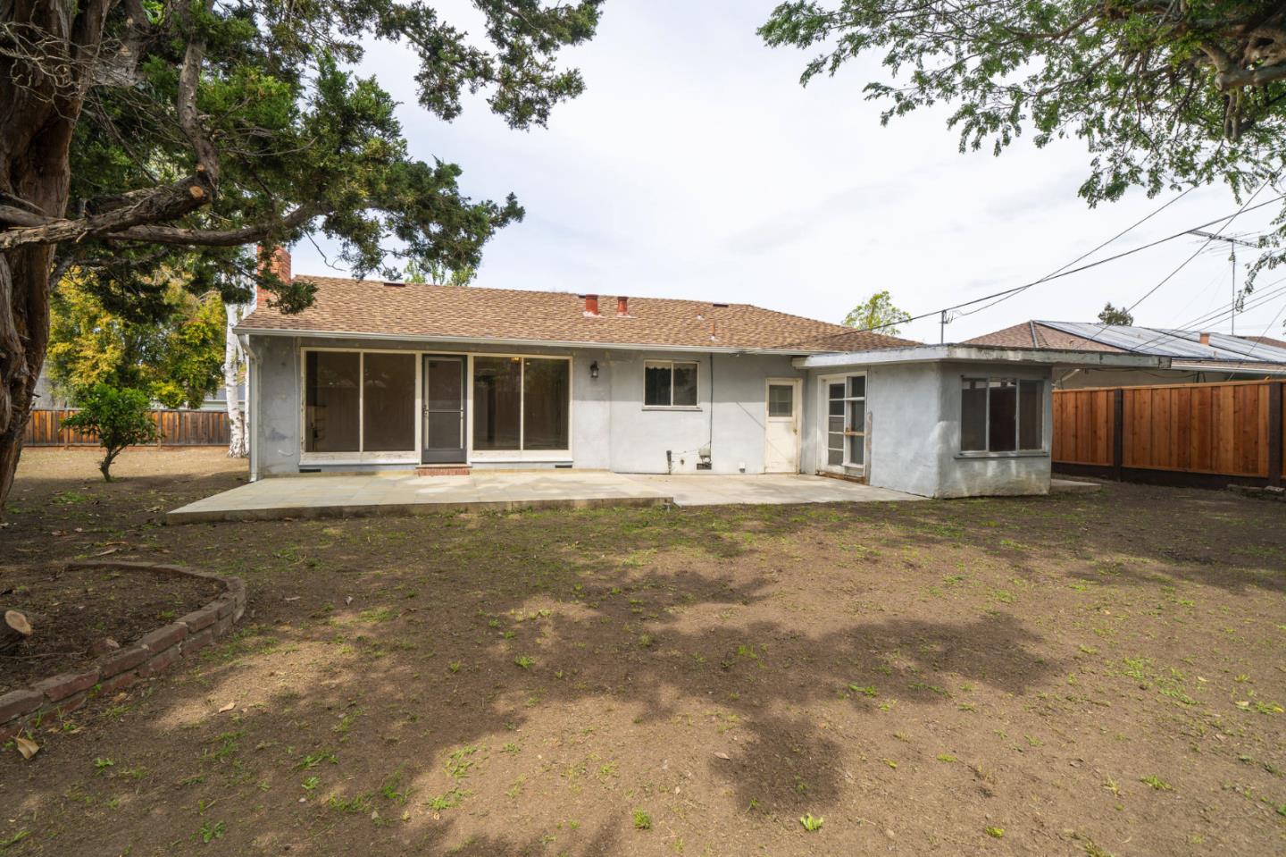 1222 Morningside Drive Sunnyvale, CA 94087 - Photo 10 of 34 a front view of a house with a garden