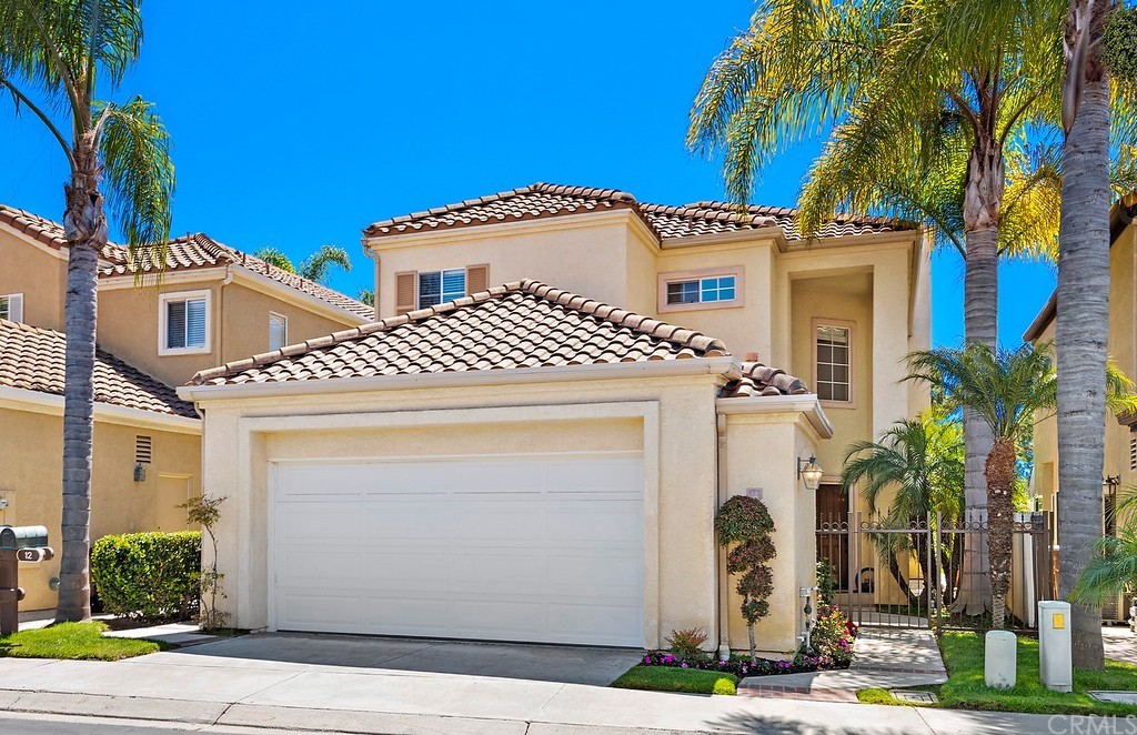 a front view of a house with a garage