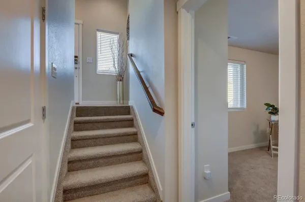 a view of an entryway with staircase