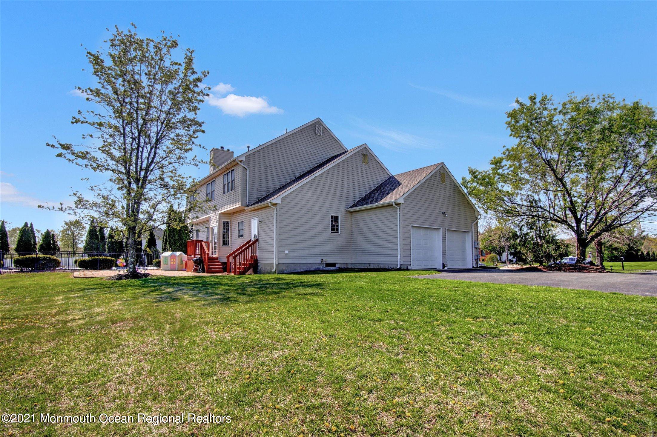 19 Leiden Road Freehold, NJ 07728 - Photo 4 of 25 Two Car garage