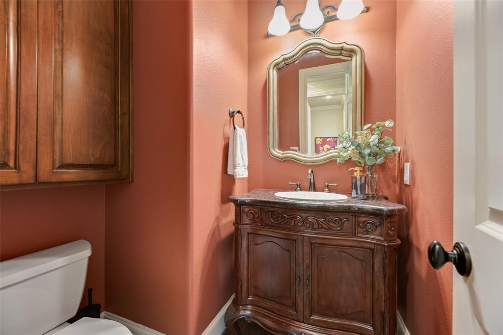 1909 Rising Star Drive Allen, TX 75013 - Photo 15 of 26 Bathroom with vanity and toilet