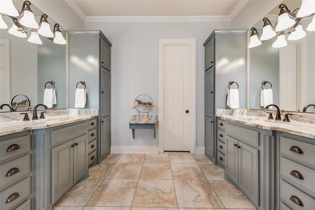1909 Rising Star Drive Allen, TX 75013 - Photo 19 of 26 Full bath with two vanities, ornamental molding, and suspended lighting