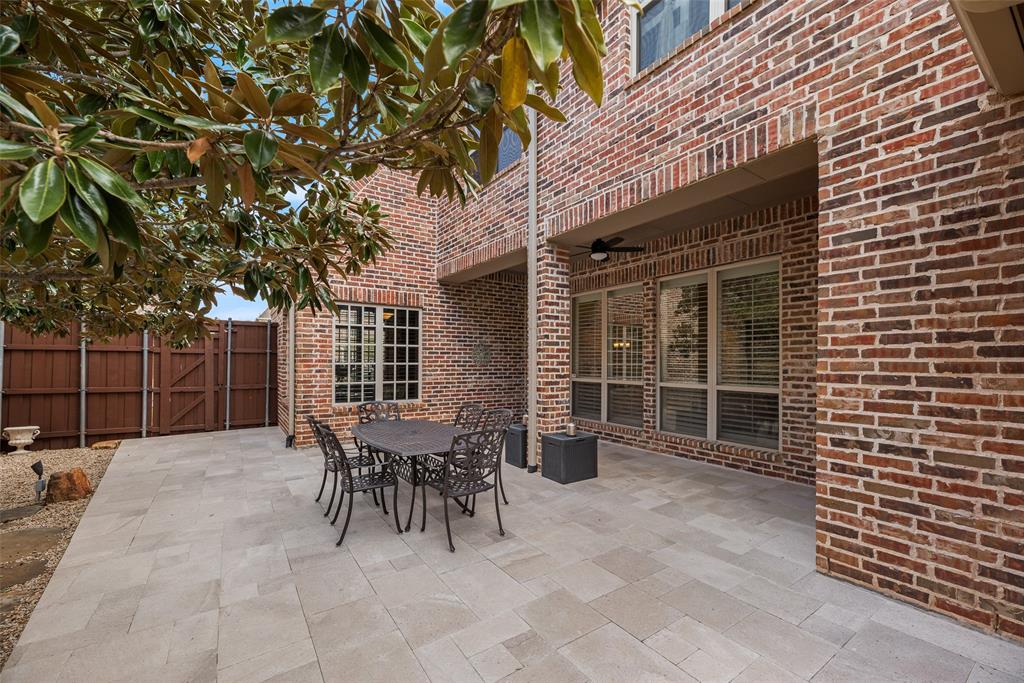 1909 Rising Star Drive Allen, TX 75013 - Photo 20 of 26 View of patio / terrace featuring a gate, outdoor dining area, and ceiling fan