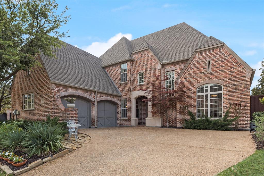1909 Rising Star Drive Allen, TX 75013 - Photo 2 of 26 View of front of house featuring roof with shingles, brick siding, driveway, and a garage