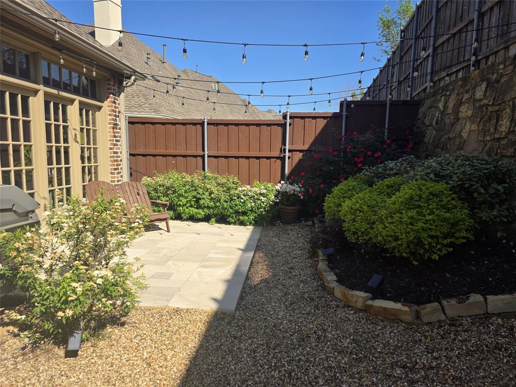 1909 Rising Star Drive Allen, TX 75013 - Photo 22 of 26 Fenced yard with a patio area