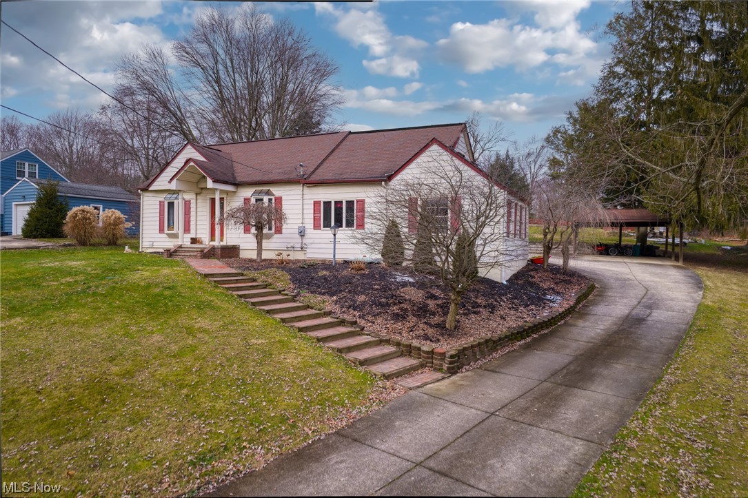 227 South Messner Road New Franklin, OH 44319 - Photo 2 of 44 View of front of house featuring a front lawn and a carport