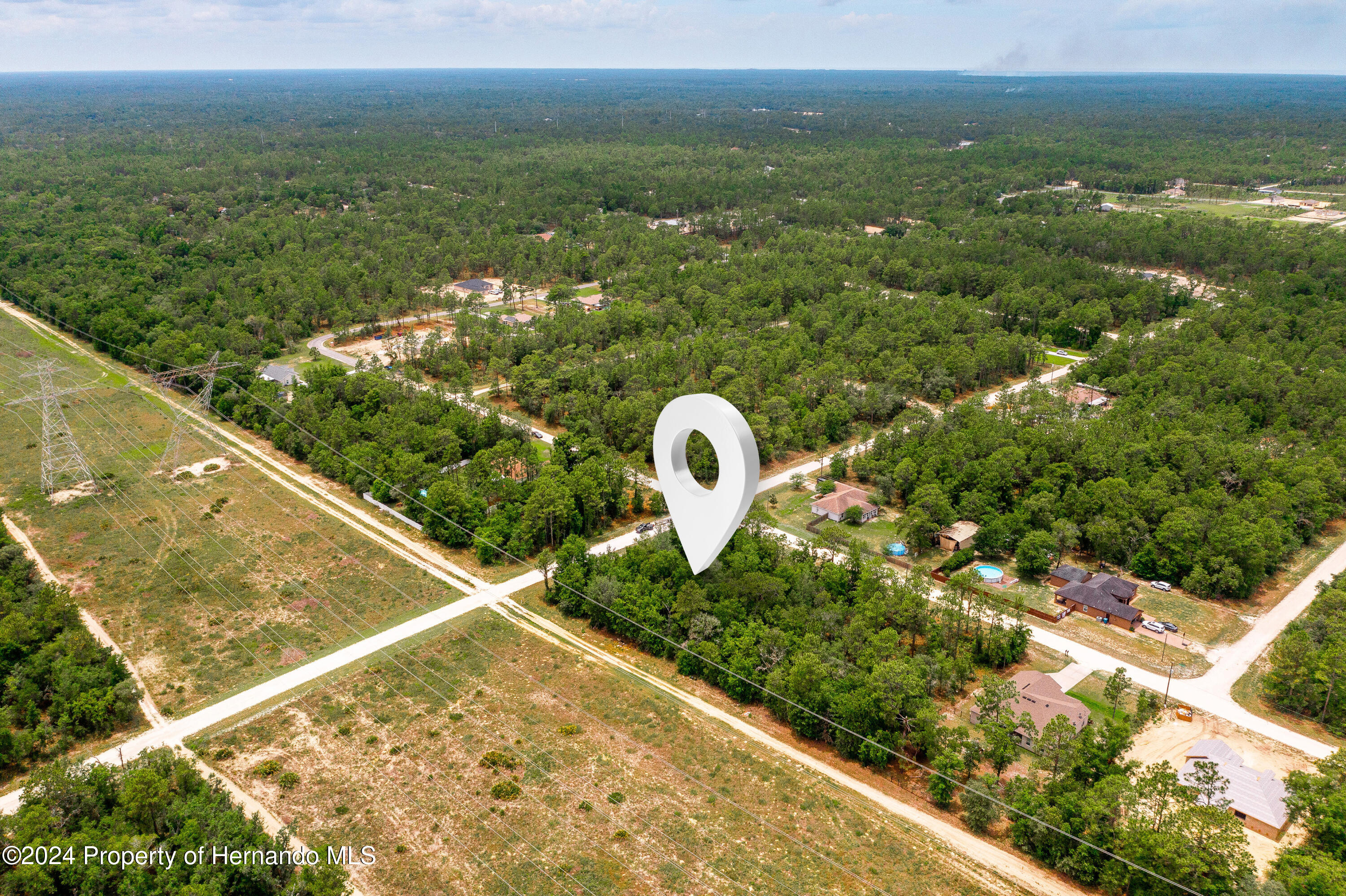 13500 Downy Woodpecker Road Weeki Wachee, FL 34614 - Photo 2 of 28 a view of a lake from a balcony